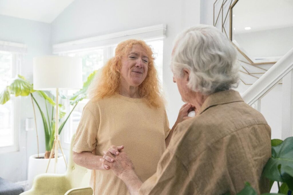 Patients dancing/holding hands